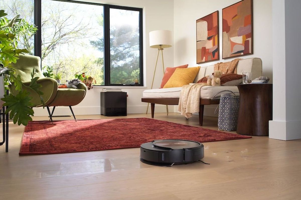 photo of iRobot Roomba j9+ robot vacuum and mop cleaning the floor